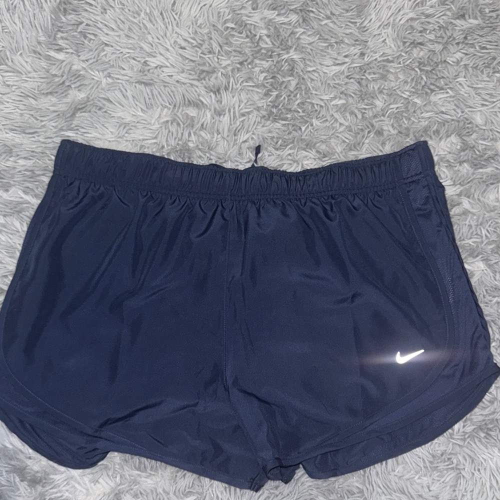 Dark blue Nike running shorts